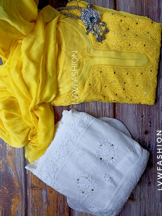 Elegant white and yellow georgette Gharara set with intricate Chikankari embroidery by LVW Fashion, showcasing traditional craftsmanship.