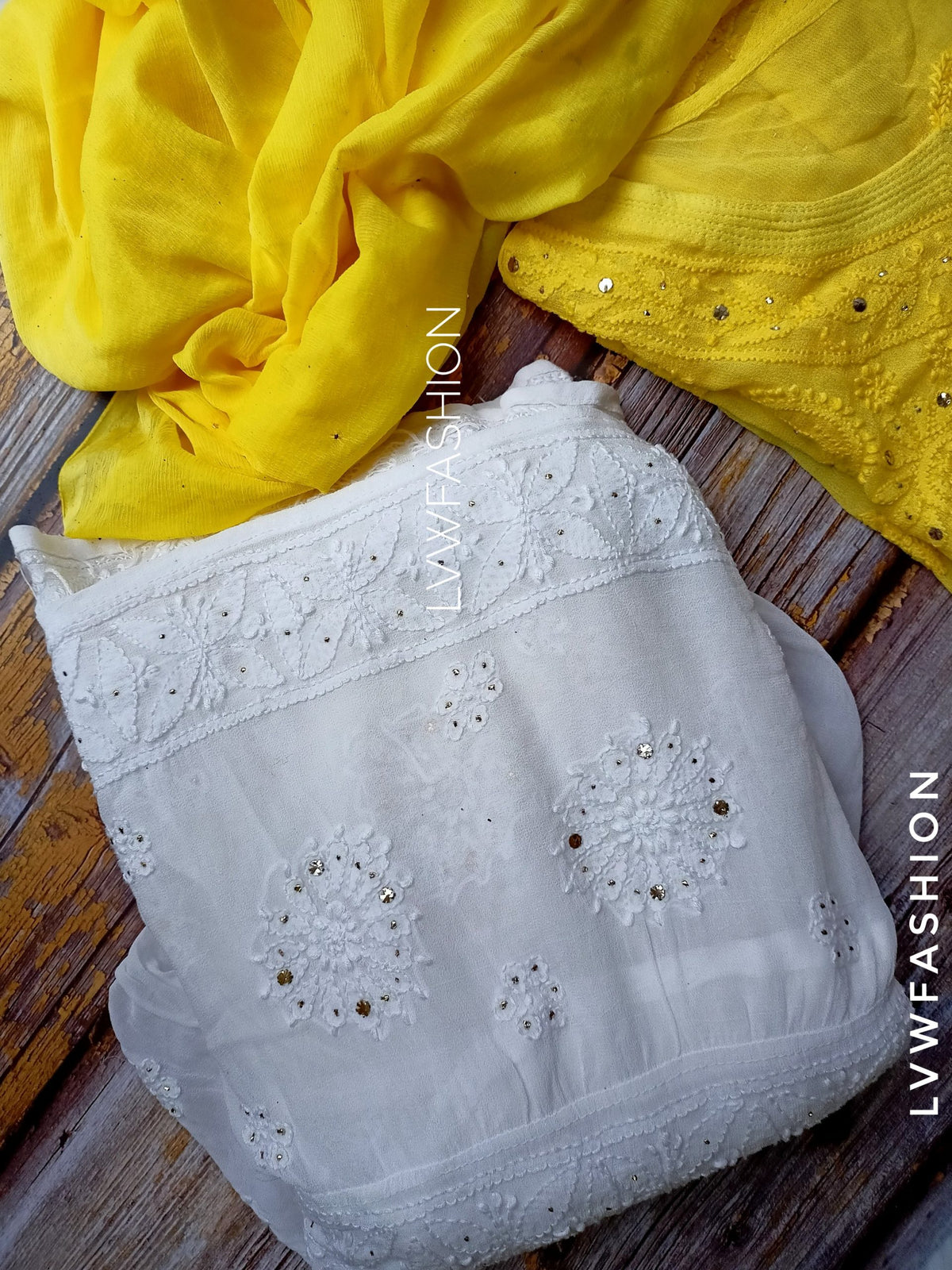 White and yellow georgette Gharara set with intricate Chikankari embroidery from LVW Fashion Luxurious Chikankari.