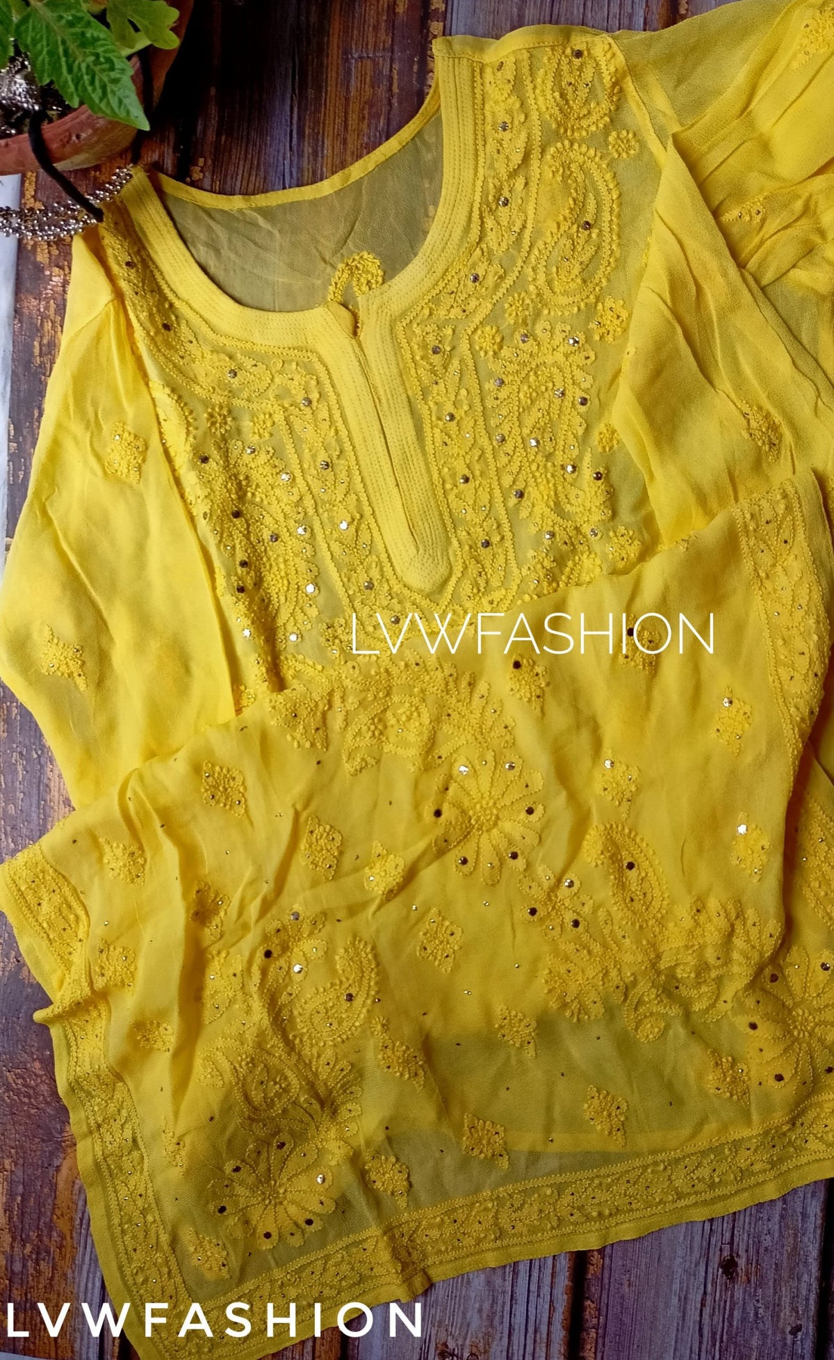 Premium white and yellow georgette Gharara set by LVW Fashion with intricate Chikankari embroidery.