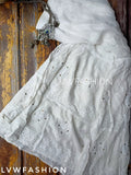 White and yellow georgette Gharara set with intricate Chikankari embroidery from LVW Fashion Luxurious Chikankari.