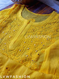 White and yellow georgette Gharara set with intricate Chikankari embroidery by LVW Fashion, featuring a luxurious traditional design.
