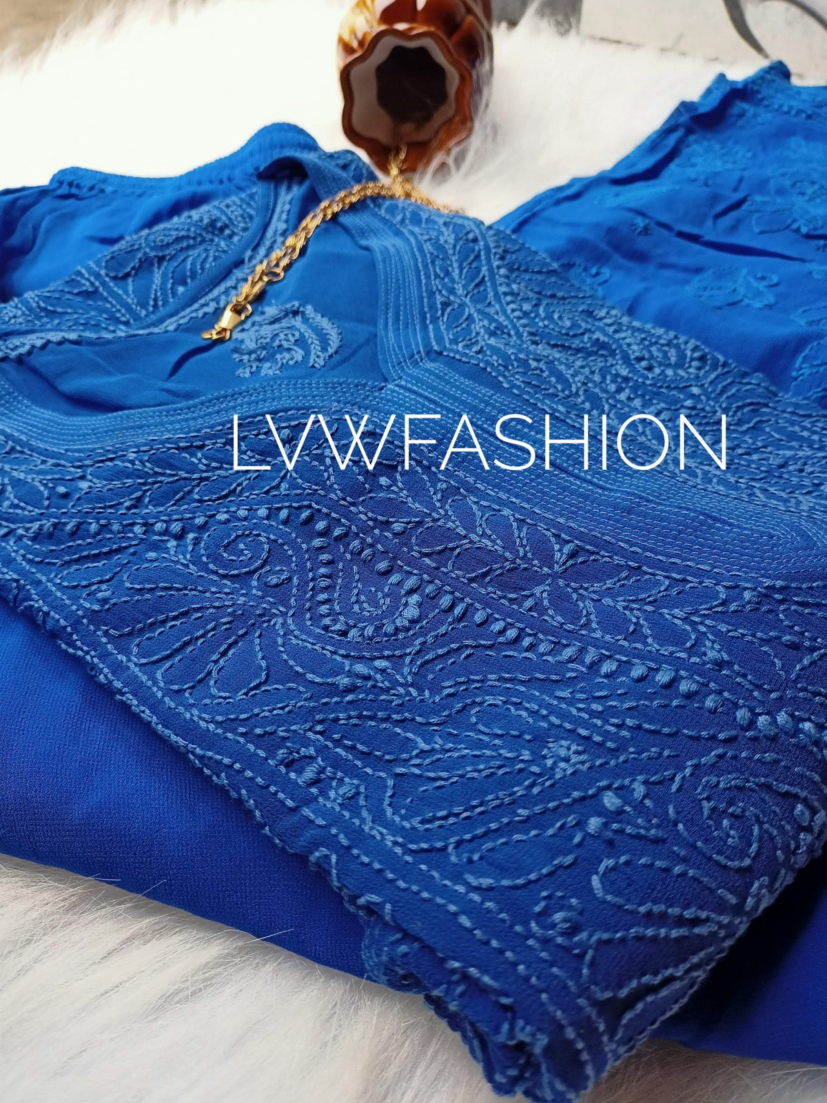Premium midnight blue georgette 3-piece set from LVW Fashion Luxurious Chikankari featuring elegant fabric and intricate embroidery.