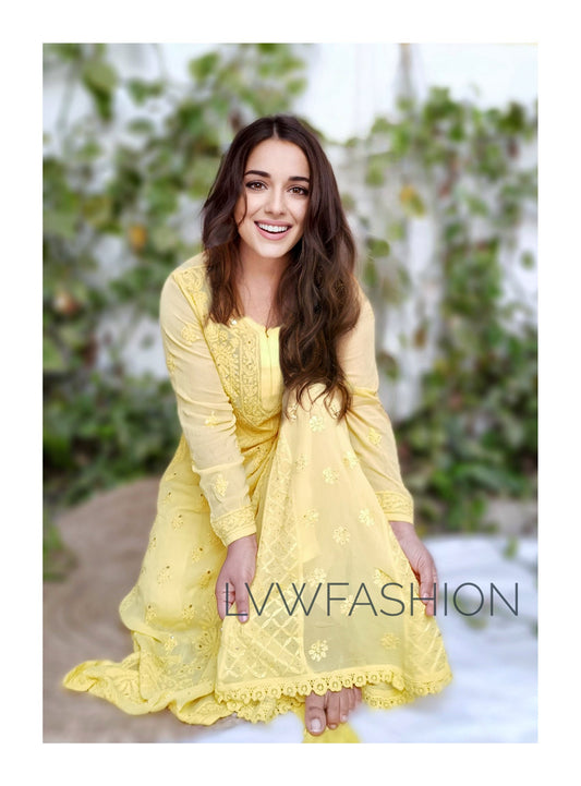 Yellow georgette 3-piece sharara set with intricate chikankari embroidery by LVW Fashion, shown on a model.