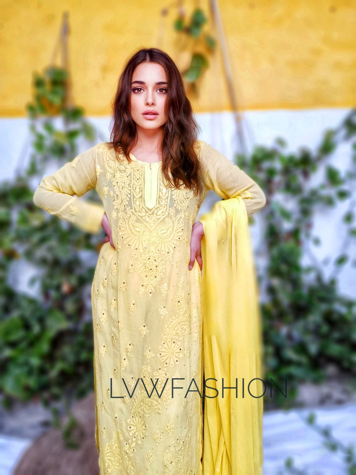 Premium yellow georgette sharara set with intricate chikankari embroidery, featuring a three-piece design by LVW Fashion.