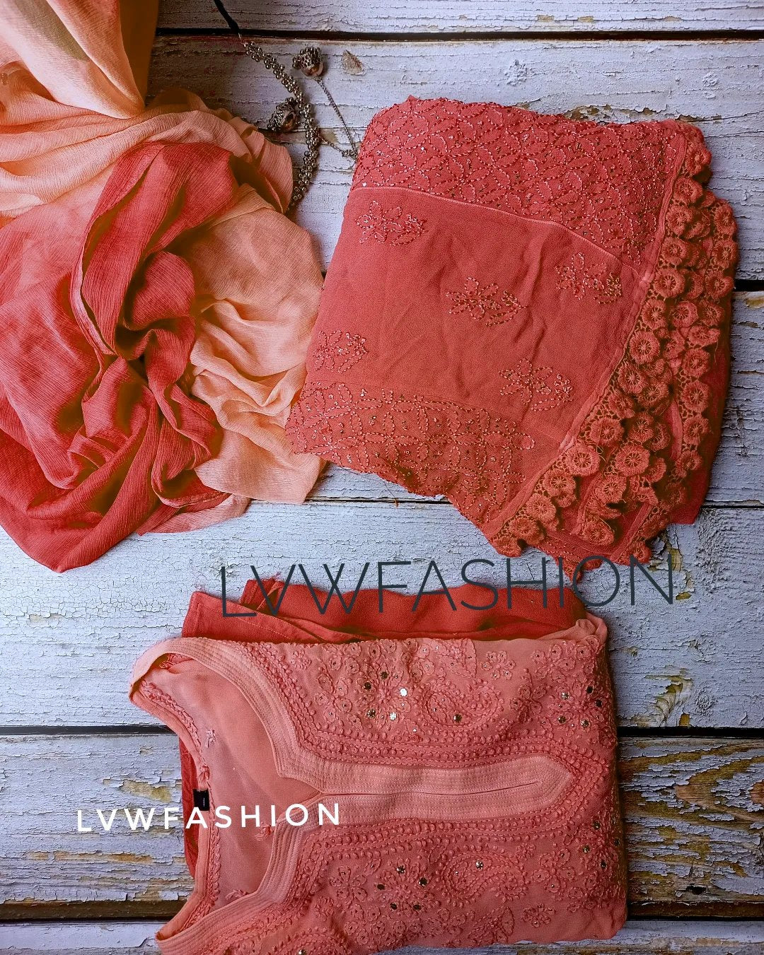Rust orange premium georgette 3-piece set by LVW Fashion with intricate chikankari embroidery, elegant and luxurious.