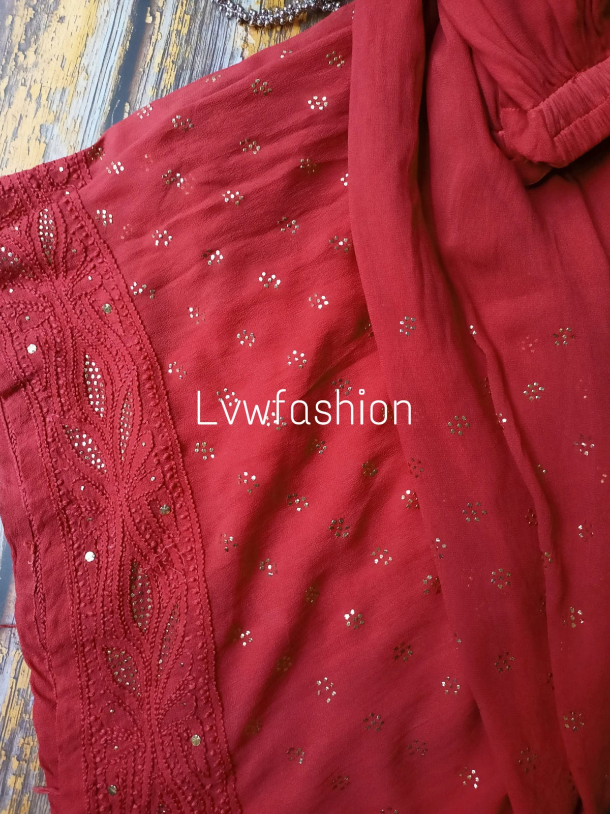 Smokey red premium Georgette 3-piece set by LVW Fashion featuring intricate Chikankari embroidery and elegant fabric details.