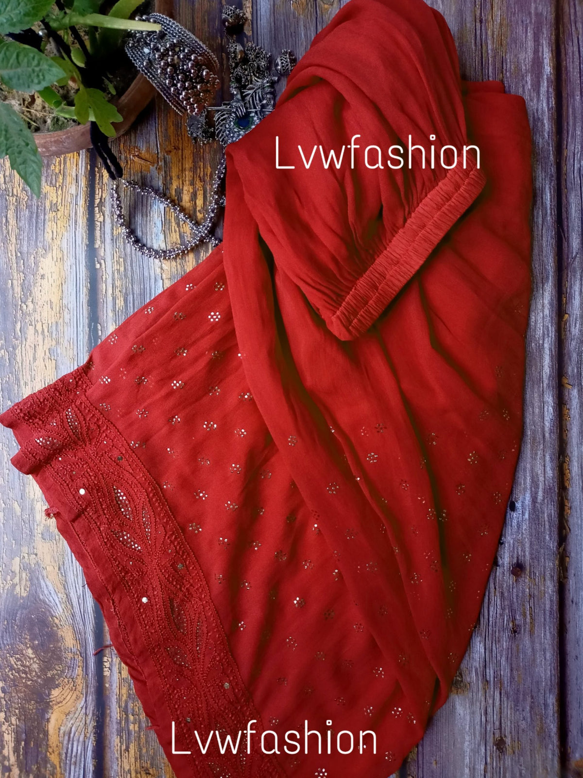 Smokey red premium georgette 3-piece set by LVW Fashion with intricate chikankari embroidery on the fabric.
