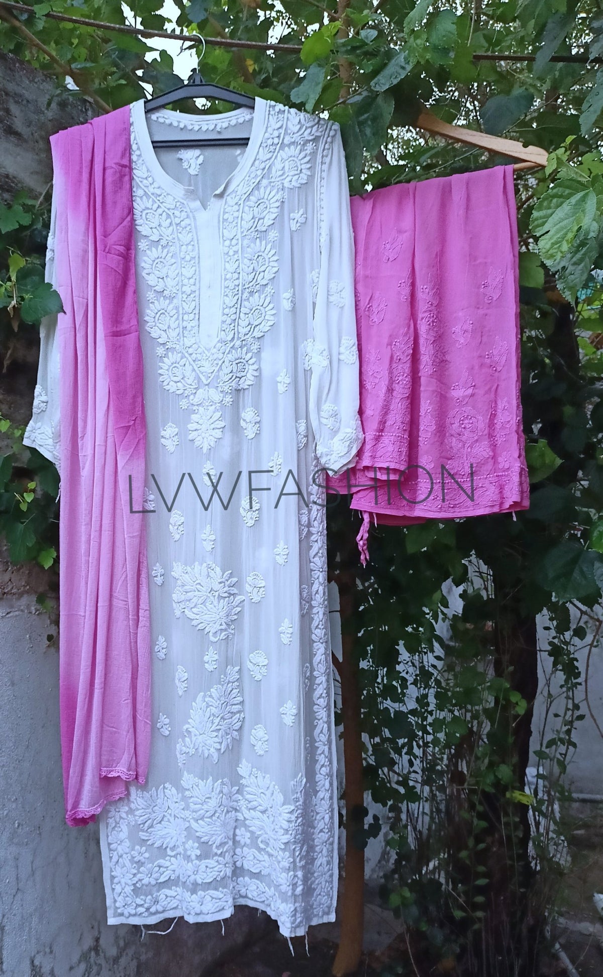 Beautiful Adaya Premium Georgette 3-Piece Plazzo Set with intricate Chikankari embroidery, featuring flowing fabric and elegant design.