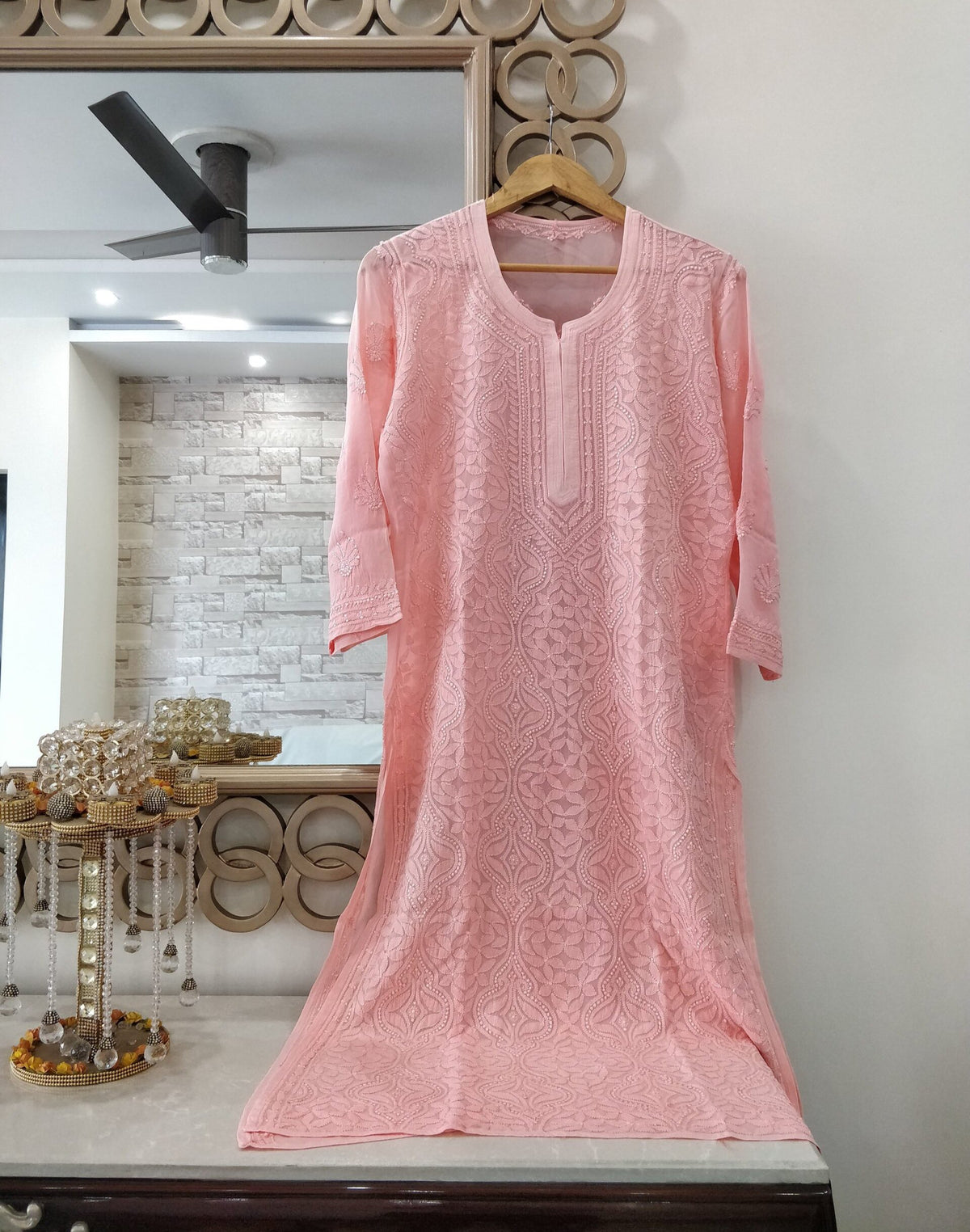 Beautiful peach pastel shade Resham thread kurta with slip from LVW Fashion Luxurious Chikankari, showcasing intricate embroidery.