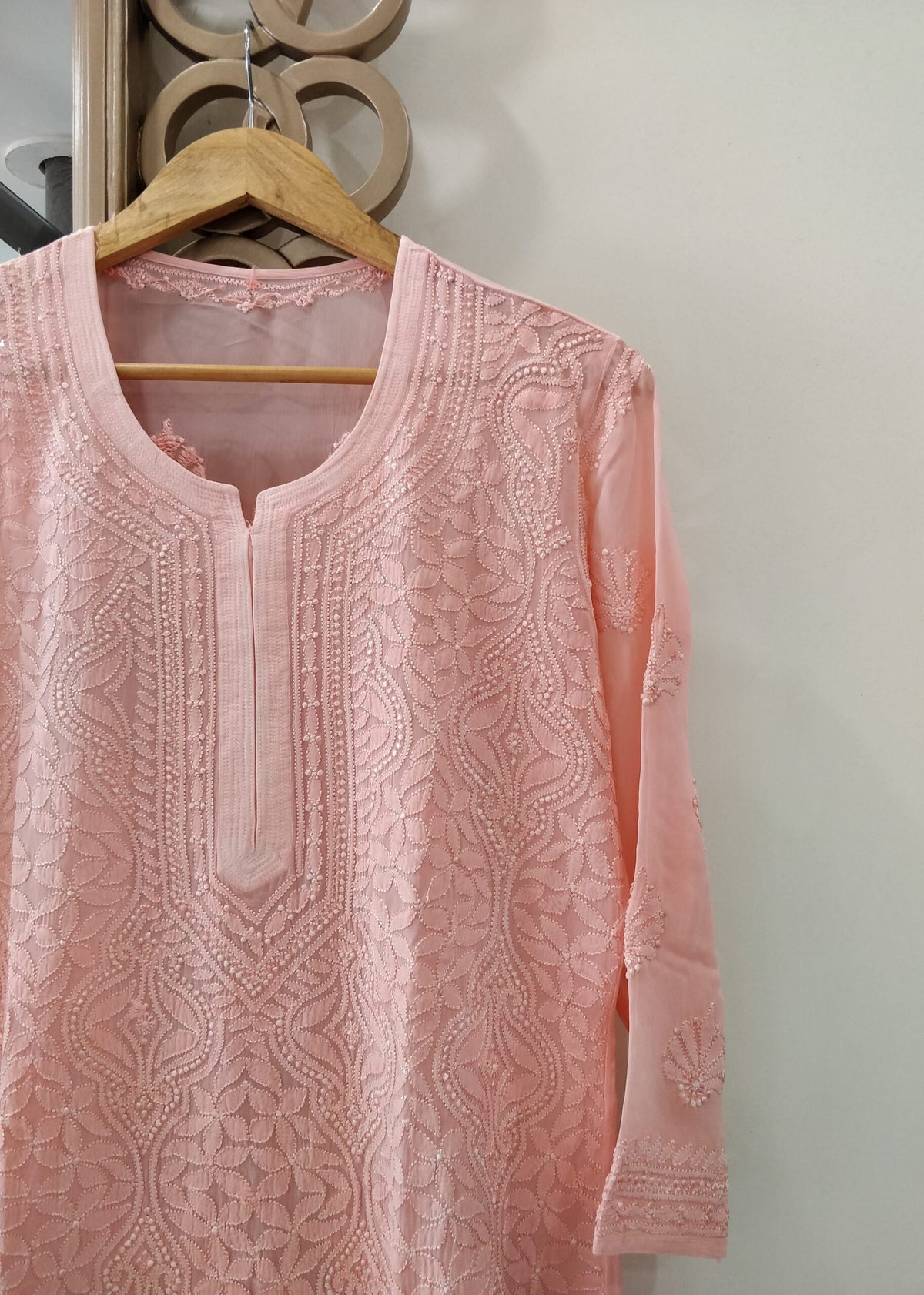 Beautiful peach pastel Resham thread kurta with slip from LVW Fashion Luxurious Chikankari, showcasing intricate embroidery and elegant design.