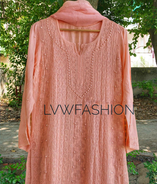 Elegant peach georgette 3-piece set by LVW Fashion with intricate chikankari embroidery, showcasing luxurious traditional design.