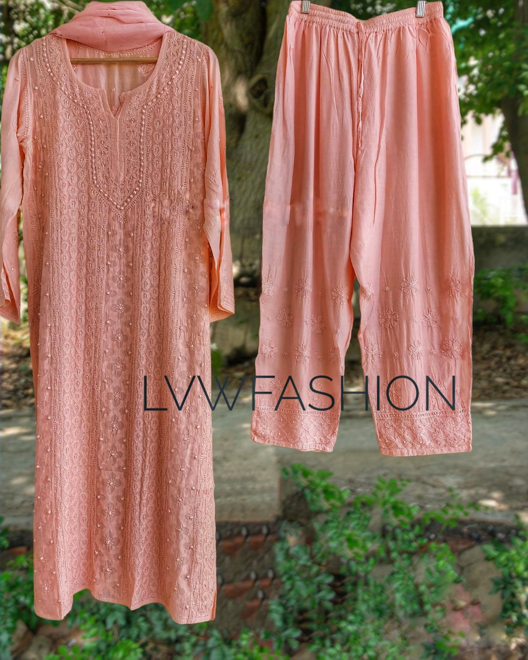 Beautiful peach premium georgette 3-piece set by LVW Fashion Luxurious Chikankari featuring intricate embroidery and elegant fabric.