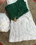 Luxurious green and white georgette fabric with intricate Chikankari embroidery, by LVW Fashion.