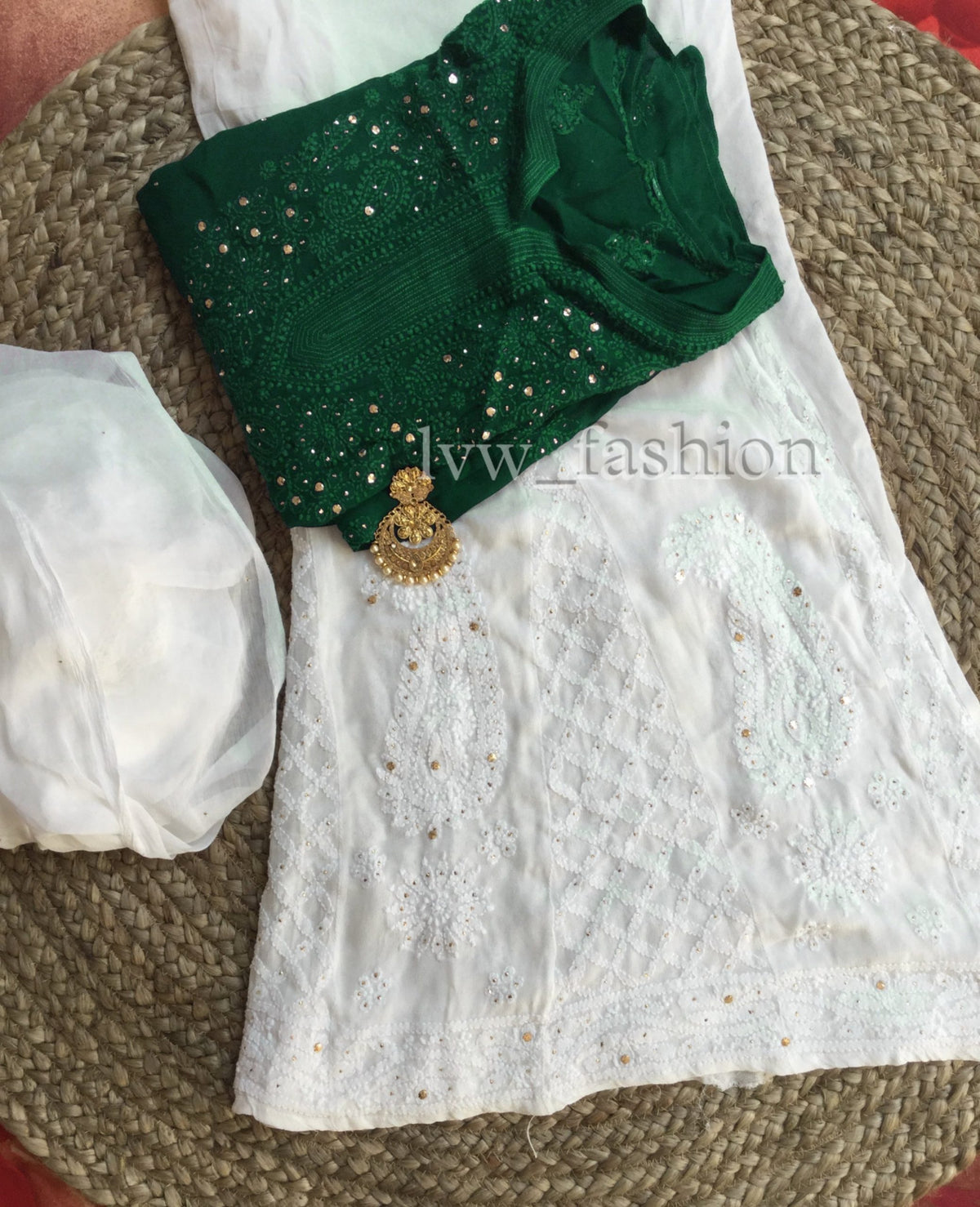 Luxurious green and white georgette fabric with intricate Chikankari embroidery, by LVW Fashion.