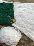 Luxurious green and white georgette fabric with intricate Chikankari embroidery by LVW Fashion, showcasing elegant craftsmanship.