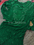 Elegant green and white georgette fabric with intricate chikankari embroidery by LVW Fashion, showcasing luxurious craftsmanship.