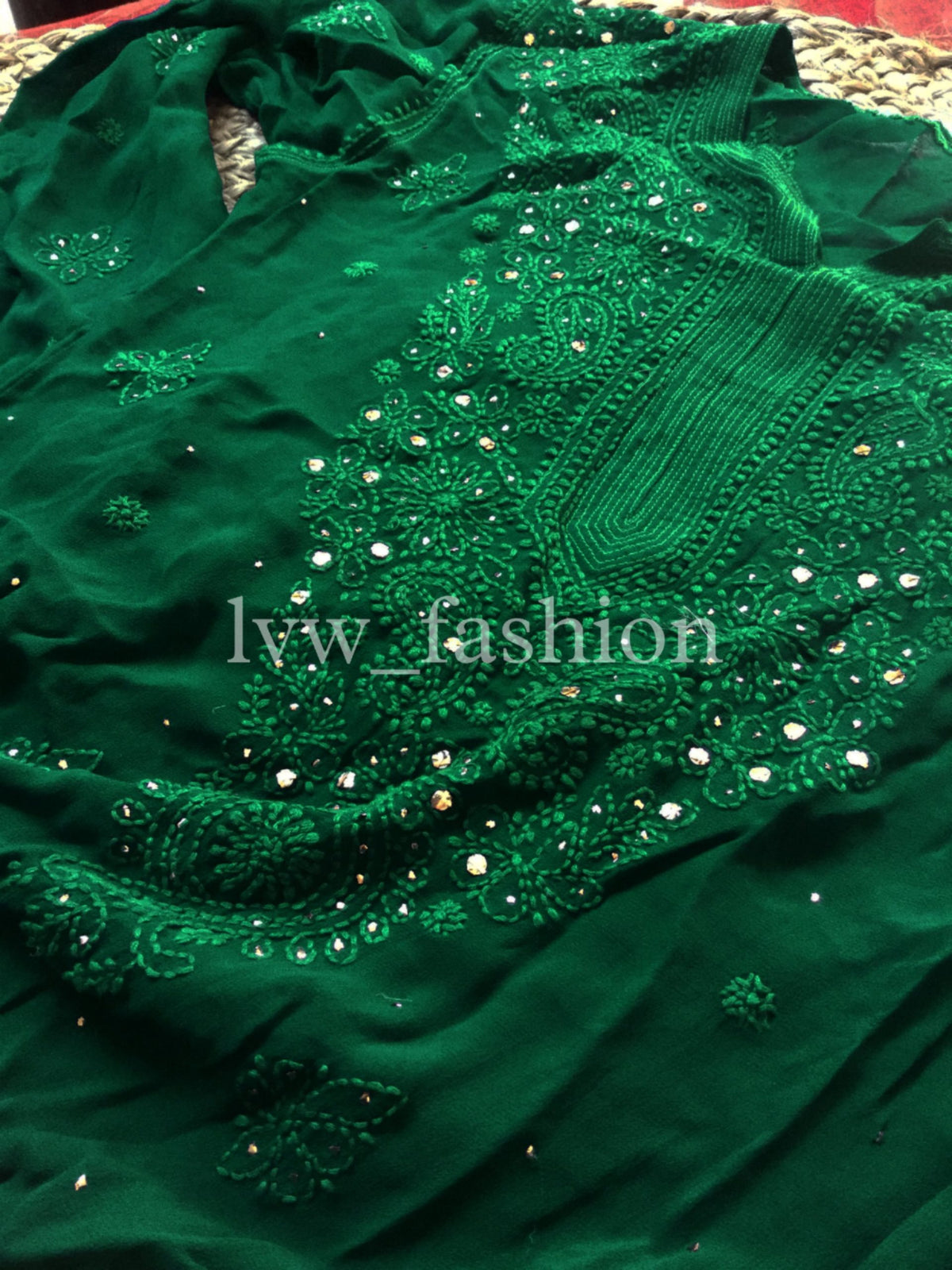 Luxurious green and white georgette fabric with intricate chikankari embroidery, by LVW Fashion.