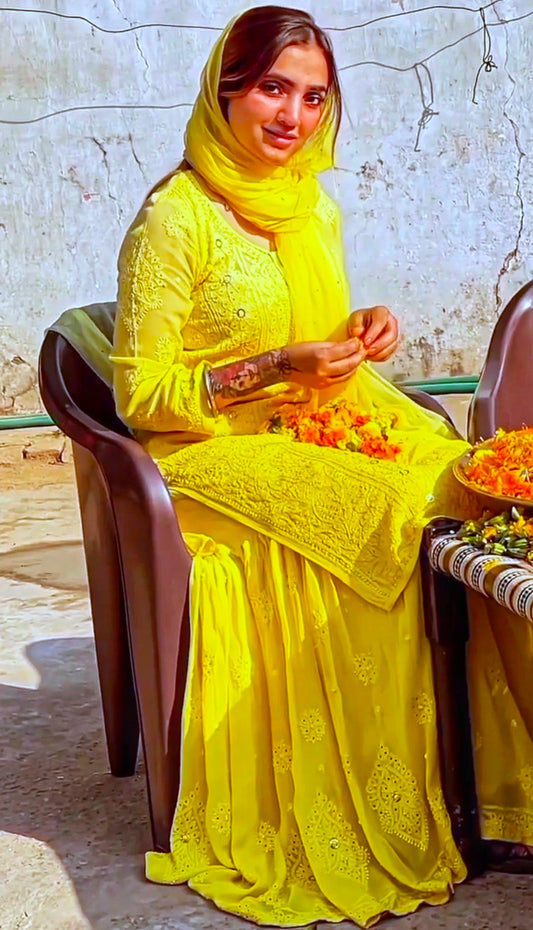 Beautiful yellow georgette Gharara Chikankari set by LVW Fashion, featuring intricate embroidery and luxurious fabric details.