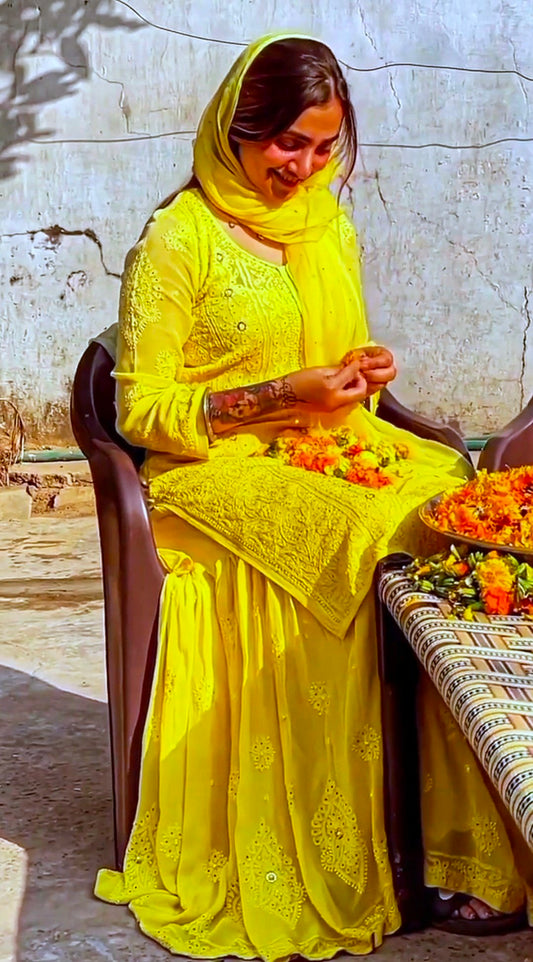 Beautiful yellow georgette Gharara Chikankari set by LVW Fashion, featuring intricate embroidered design and luxurious fabric.