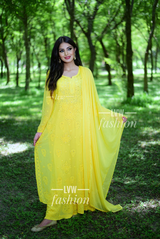 Beautiful yellow Resham embroidery georgette 3-piece set with slip from LVW Fashion Luxurious Chikankari, featuring intricate craftsmanship.