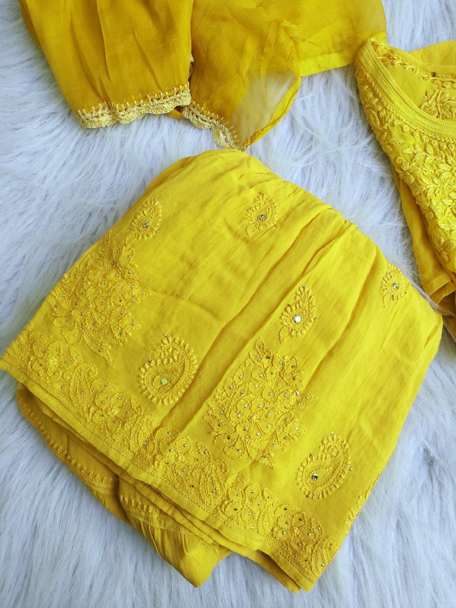 Beautiful turmeric yellow Gharara set with intricate Chikankari embroidery by LVW Fashion, featuring traditional Indian style and luxurious fabric.
