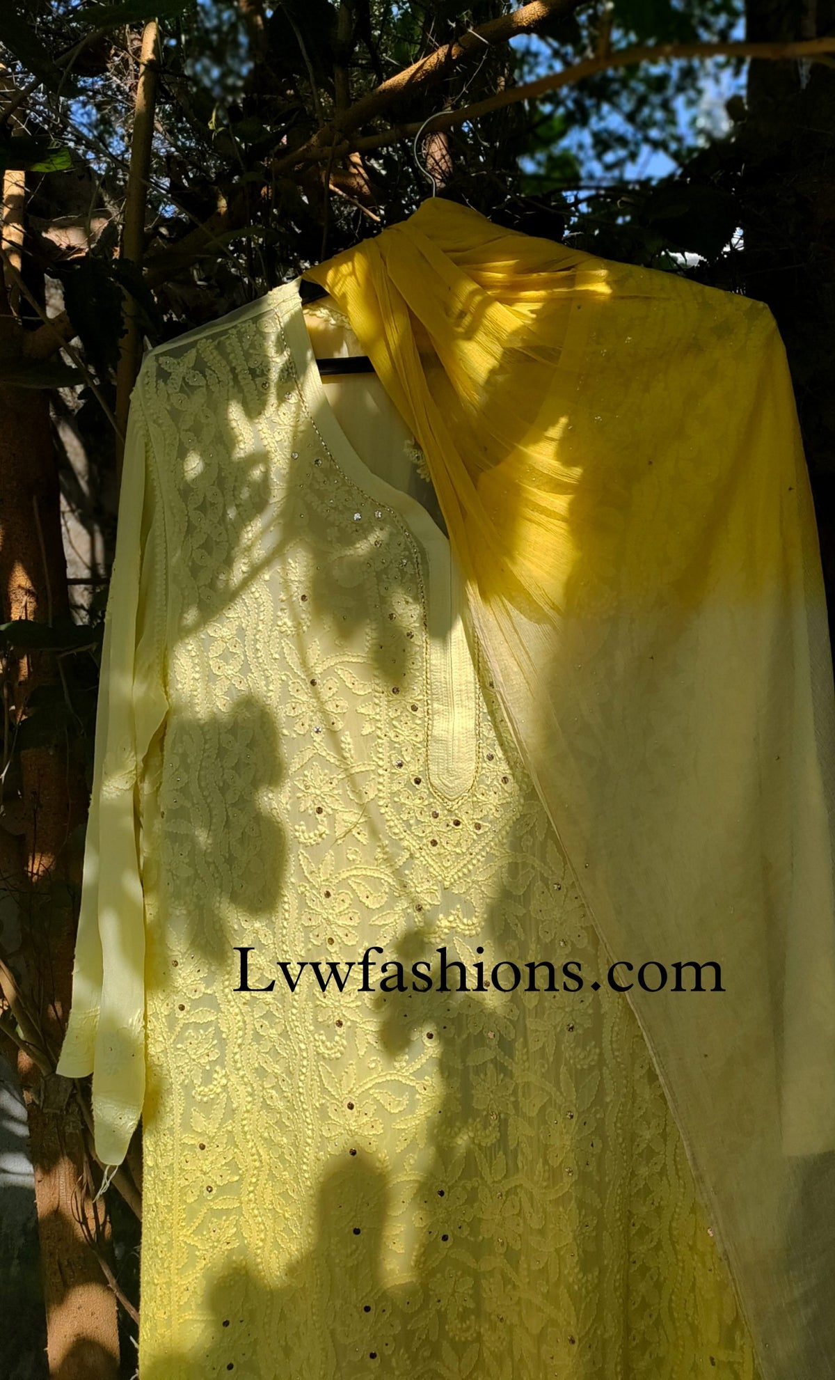Beautiful yellowish premium georgette 3-piece set with intricate chikankari embroidery, by LVW Fashion Luxurious.