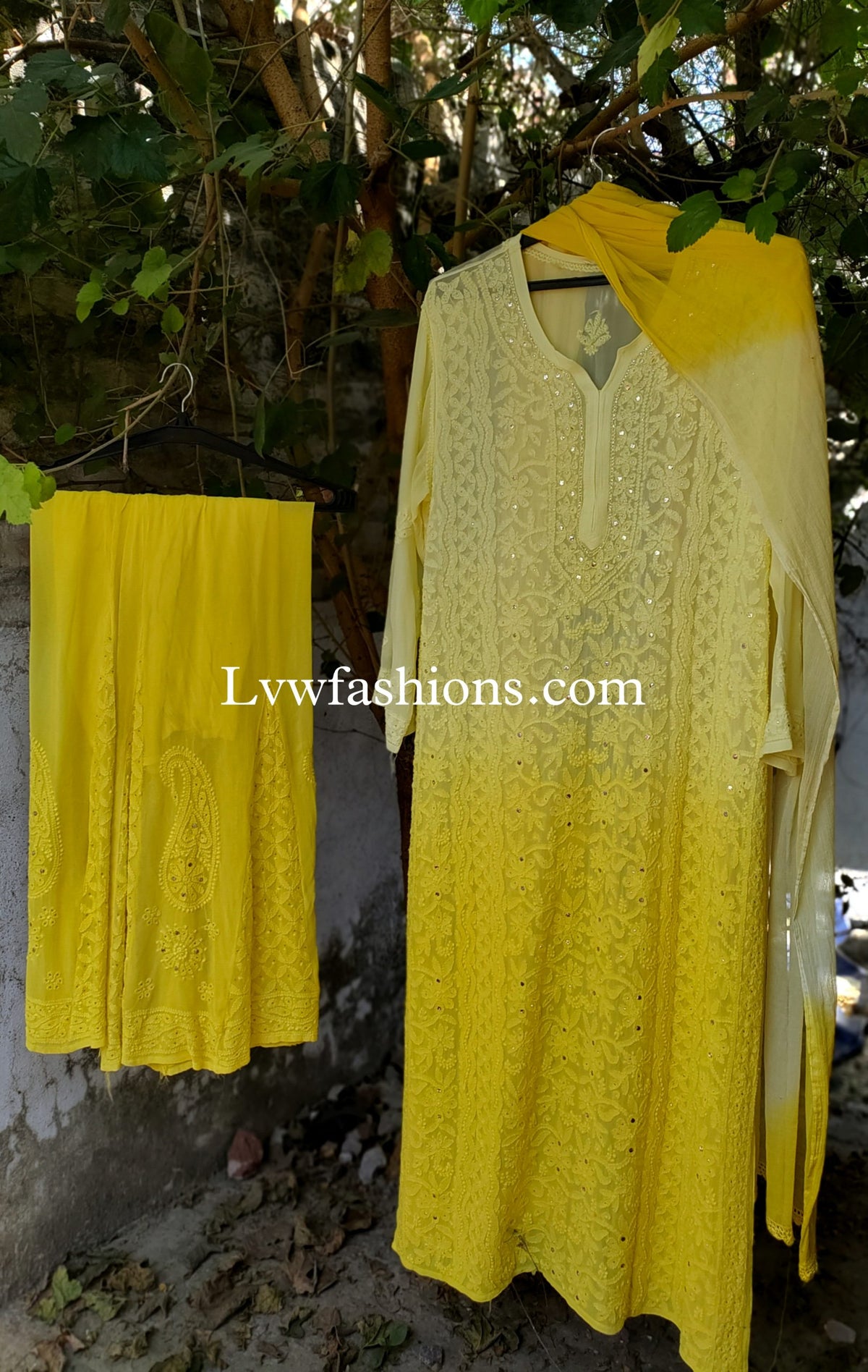 Beautiful yellowish premium georgette 3-piece set with intricate chikankari embroidery from LVW Fashion, luxurious and elegant.