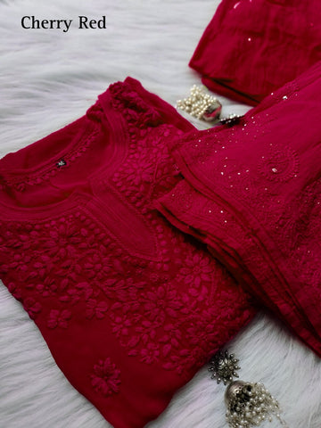 Cherry red premium georgette Gharara Chikankari set by LVW Fashion with intricate embroidery and traditional styling.