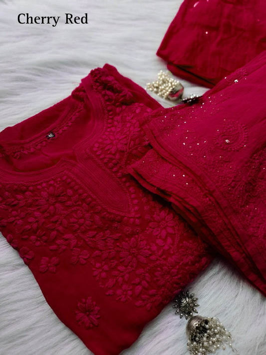Cherry red premium georgette Gharara Chikankari set by LVW Fashion with intricate embroidery and traditional styling.
