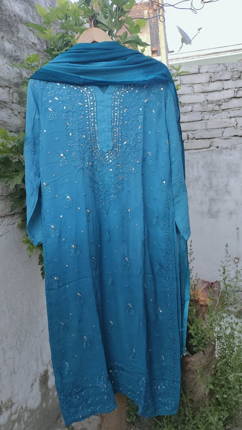 Christmas Blue premium Georgette Chikankari Kurti Set by LVW Fashion featuring intricate white chikankari embroidery on blue georgette fabric.