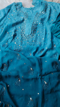 Blue Georgette Chikankari Kurti Set by LVW Fashion, featuring intricate embroidery and a festive Christmas-inspired design.