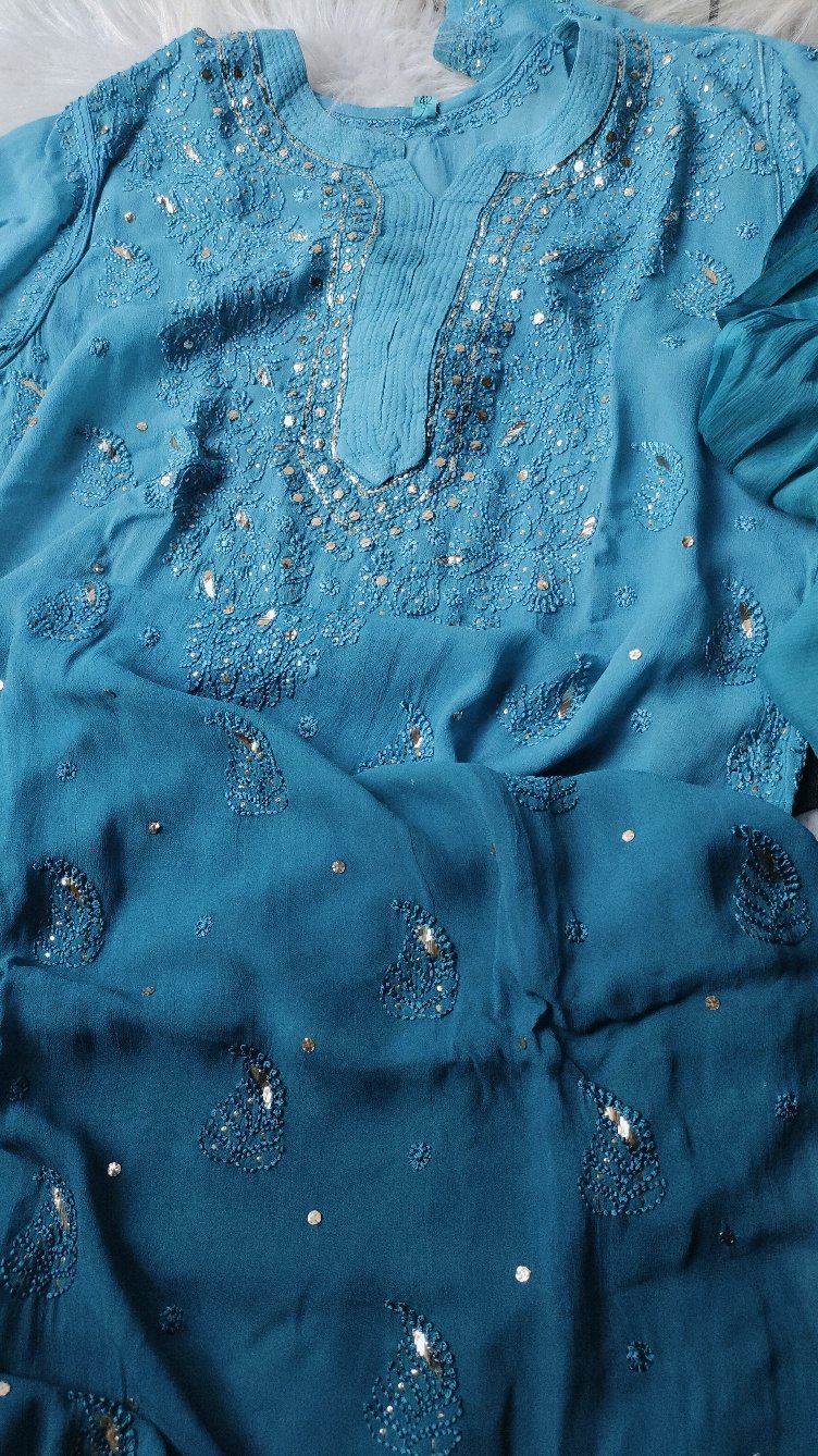 Blue Georgette Chikankari Kurti Set by LVW Fashion, featuring intricate embroidery and a festive Christmas-inspired design.