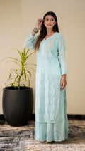 Adaya Ice Blue Premium Georgette Chikankari set by LVW Fashion featuring intricate embroidery and full traditional attire.