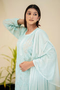 Adaya Ice Blue premium georgette Chikankari set with intricate embroidery, displayed on a hanger showcasing the full traditional outfit.
