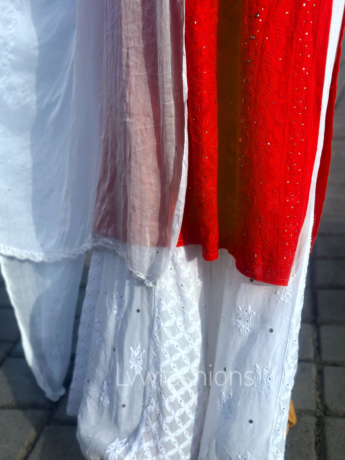 Red and white premium Georgette Chikankari Sharara set by LVW Fashion, featuring intricate embroidery and a full traditional ensemble.