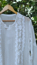 Luxurious LVW Fashion Luxurious Chikankari kurta set with pearls, Kasab embroidery, georgette fabric, and silk slip for elegant style.