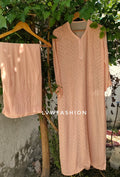 Powder Peach Premium Georgette Chikankari Suit with intricate embroidery, full set including kurta, dupatta, and matching bottoms.