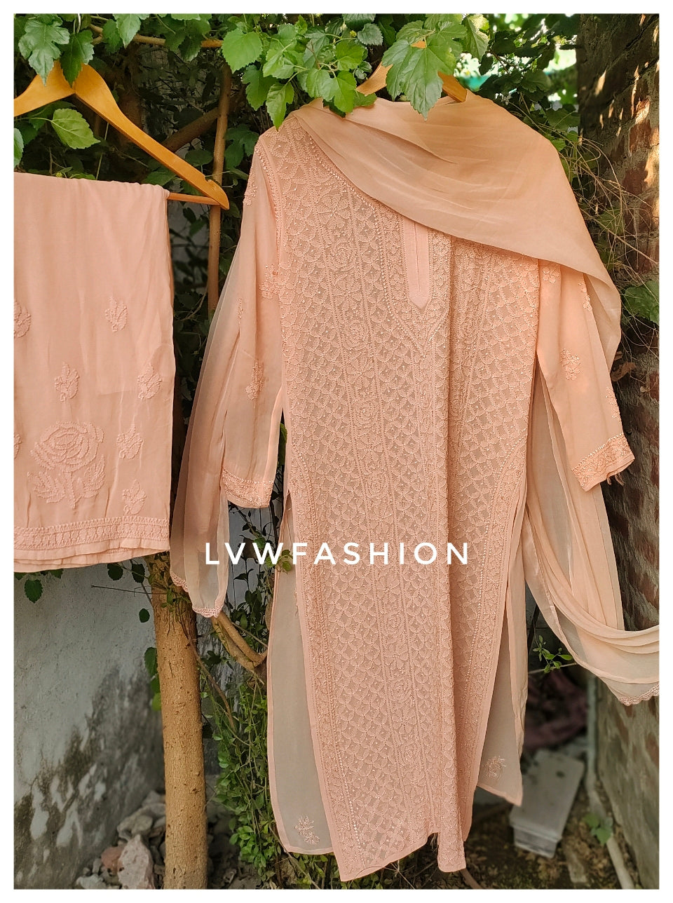 Powder Peach Premium Georgette Chikankari Suit by LVW Fashion, full set with intricate embroidery and flowing fabric.