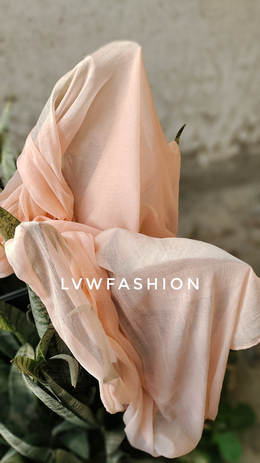 Powder peach premium georgette Chikankari suit with intricate embroidery, full set including kurta, dupatta, and churidar from LVW Fashion.