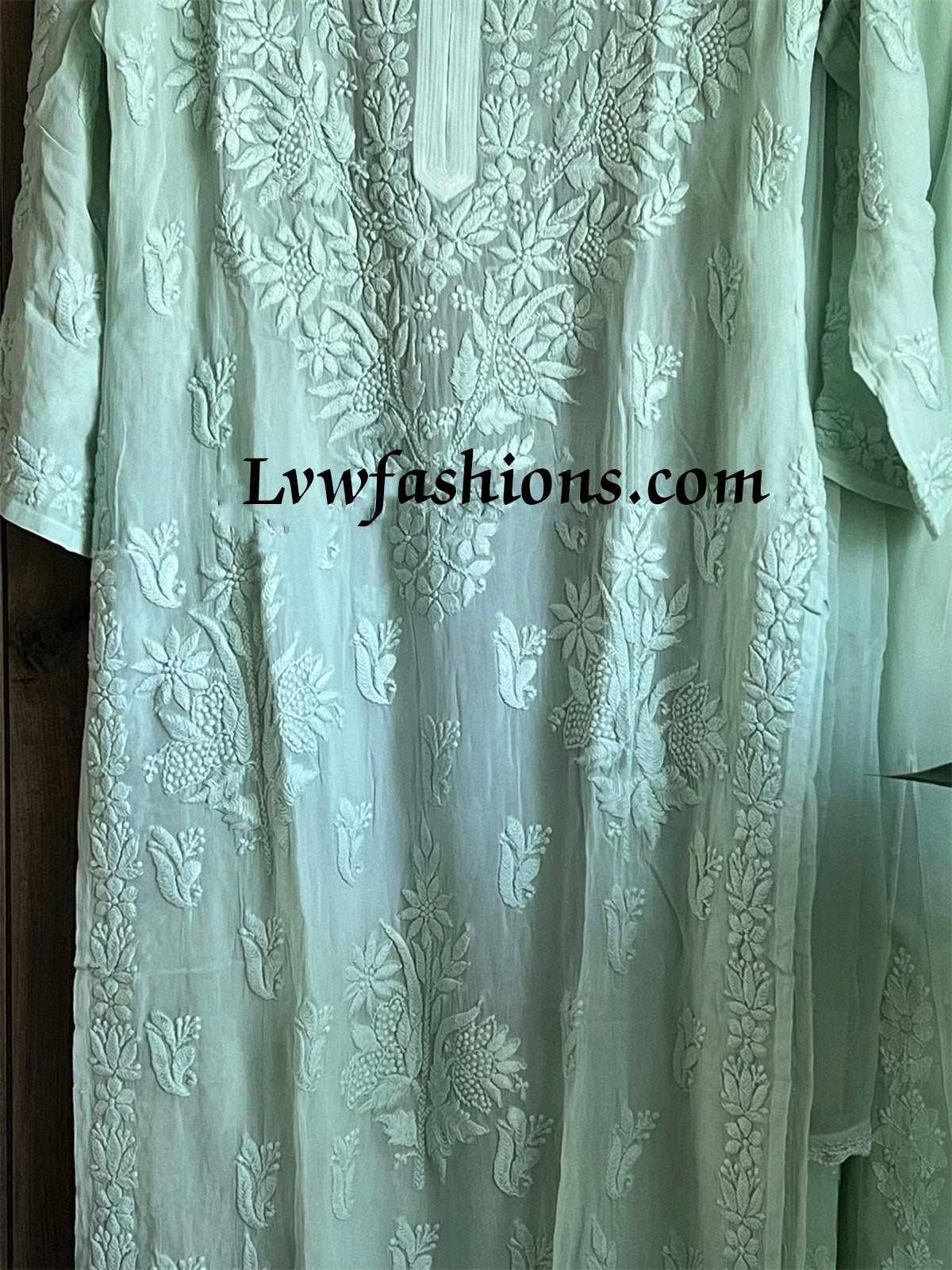 Winter green premium georgette handcrafted suit set by LVW Fashion with intricate chikankari embroidery, full ensemble displayed.