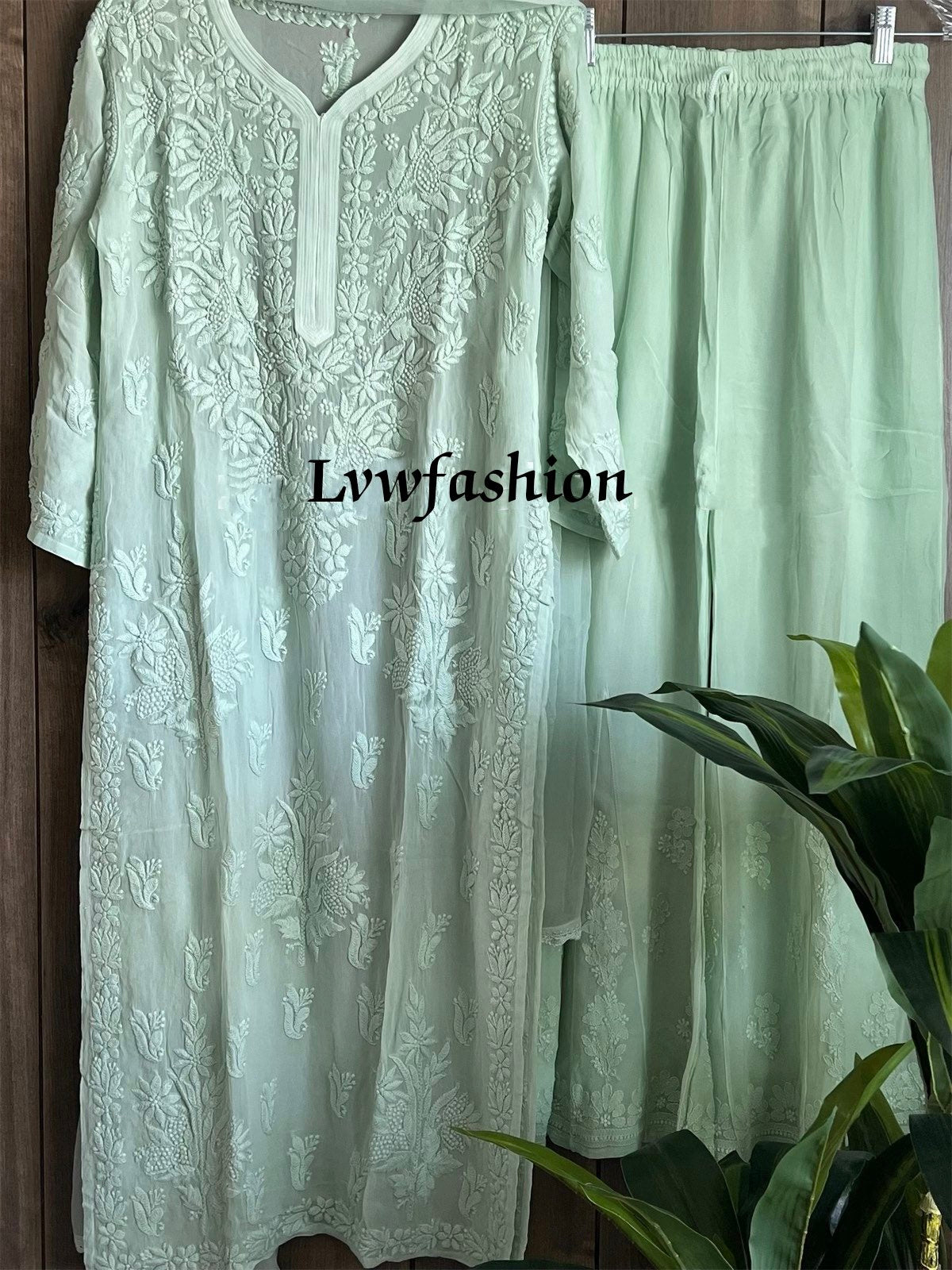 Winter Green premium georgette handcrafted suit set by LVW Fashion with intricate chikankari embroidery and full ensemble.