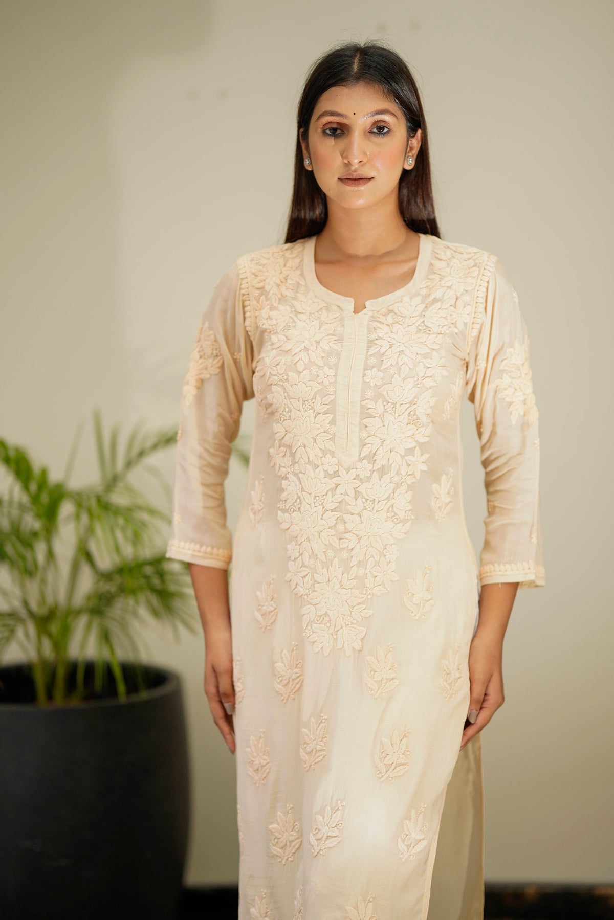 Heer Powder Brown premium silk Chikankari Kurta set with dupatta, featuring intricate embroidery and traditional craftsmanship.