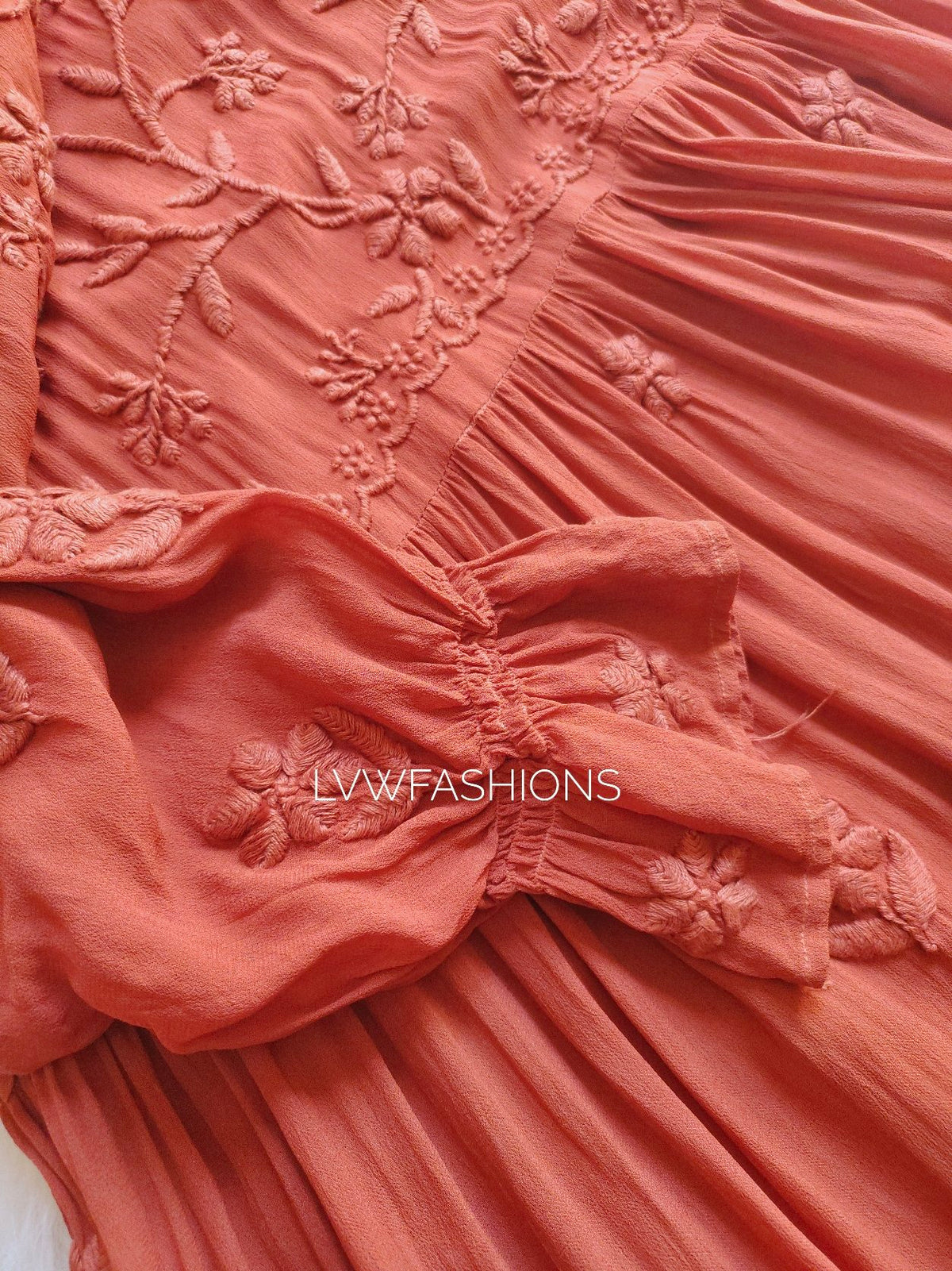 LVW Fashion luxurious Chikankari Hershey Kiss frill short top with stylish wrist detailing, elegant and intricate embroidery.
