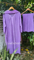 Lavender floral Georgette Sharara set with intricate Chikankari embroidery by LVW Fashion Luxurious Hoorain collection.