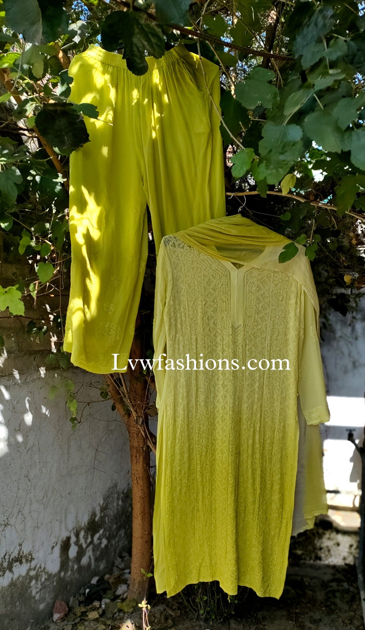 LVW Fashion luxurious Chikankari 3-piece set with premium georgette fabric and silk long slip inner, showcasing intricate embroidery.