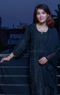 Black muslin kurta set with rose embroidery by LVW Fashion, featuring a soft fabric and traditional chikankari design.