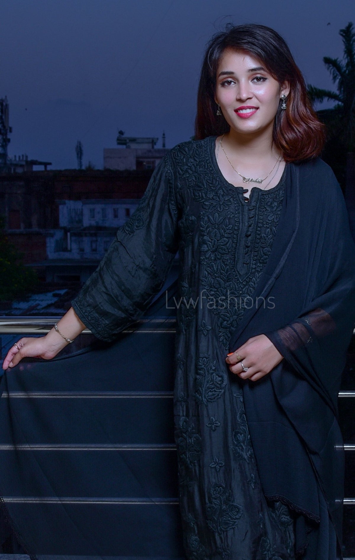 Black muslin kurta set with rose embroidery by LVW Fashion, featuring a soft fabric and traditional chikankari design.