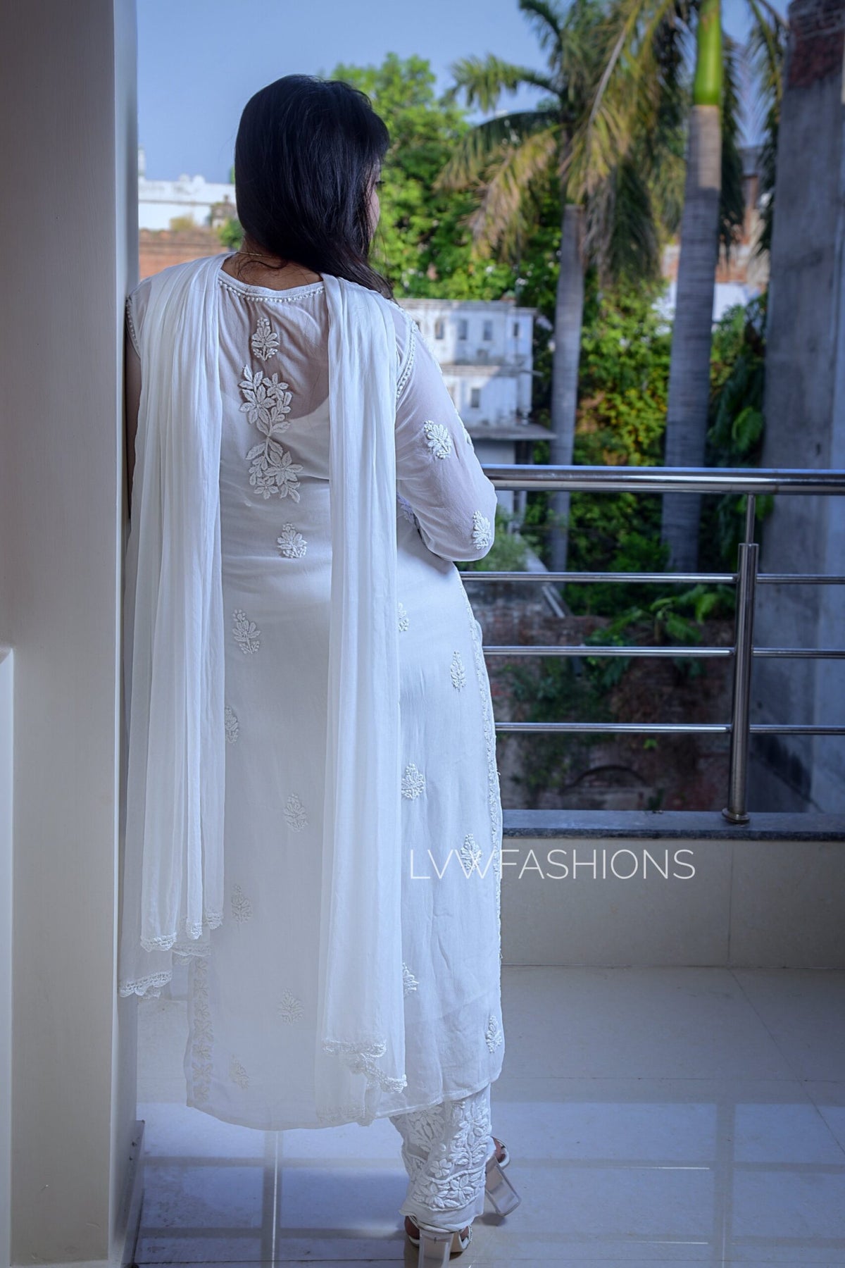 White georgette Kurta set with intricate chikankari embroidery by LVW Fashion, includes matching dupatta and traditional design.