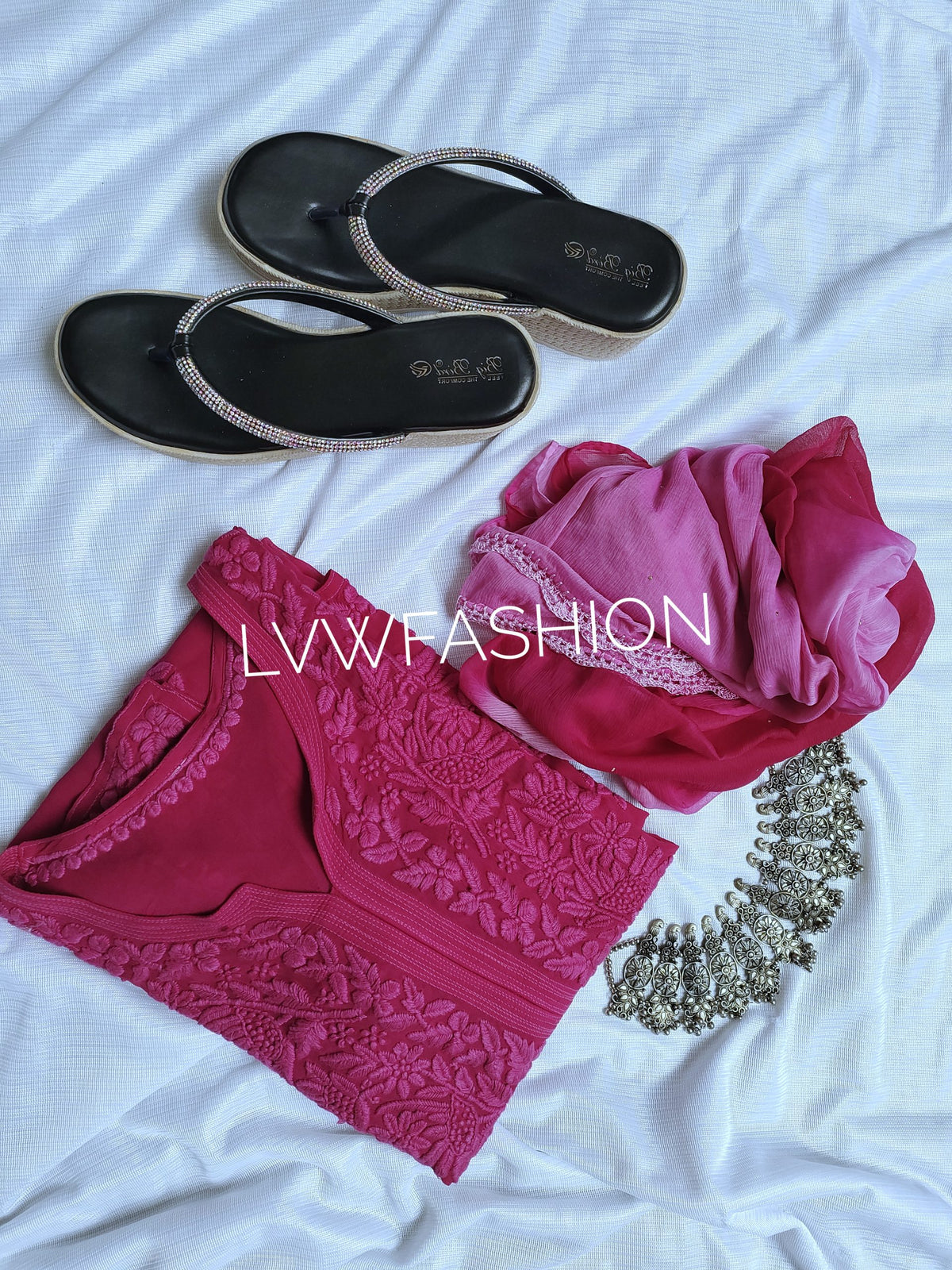 LVW Fashion luxurious Meer Kurta Duptaa set with pure Chikankari embroidery and silk slip, showcasing intricate hand embroidery.