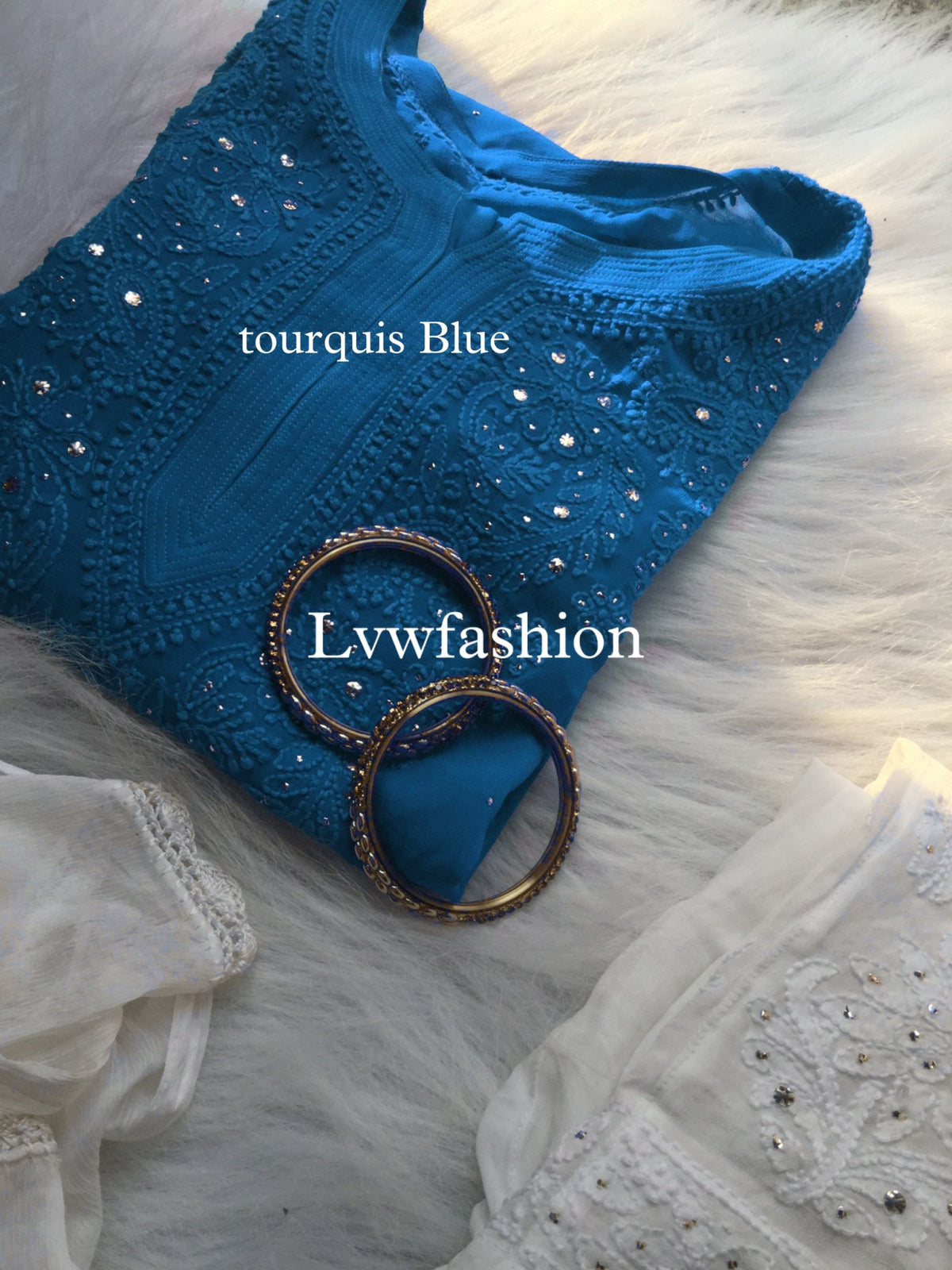 Luxurious midnight blue Georgette kurta with neck booties and slip by LVW Fashion, featuring intricate Chikankari embroidery.